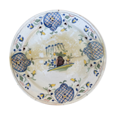 Restored antique dish with floral motif