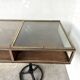 Oak and brass-mounted display cabinet on legs – Circa 1950
