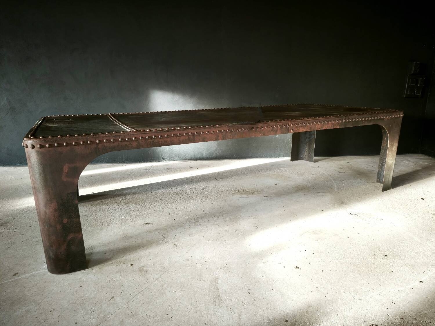 Riveted industrial table