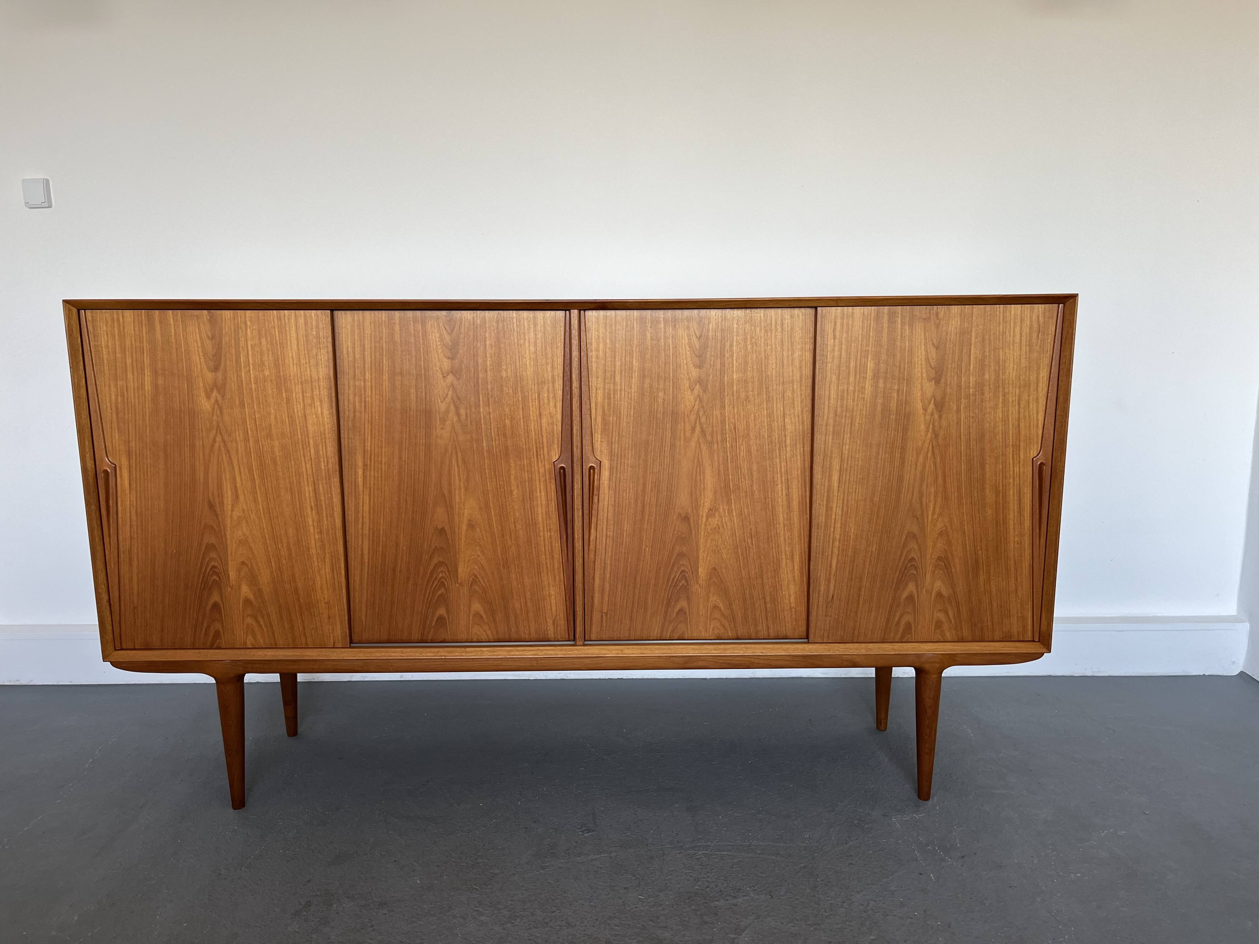 Model 19 High Sideboard in Teak with Sliding Doors by Gunni Omann for Omann Jun, 1960s