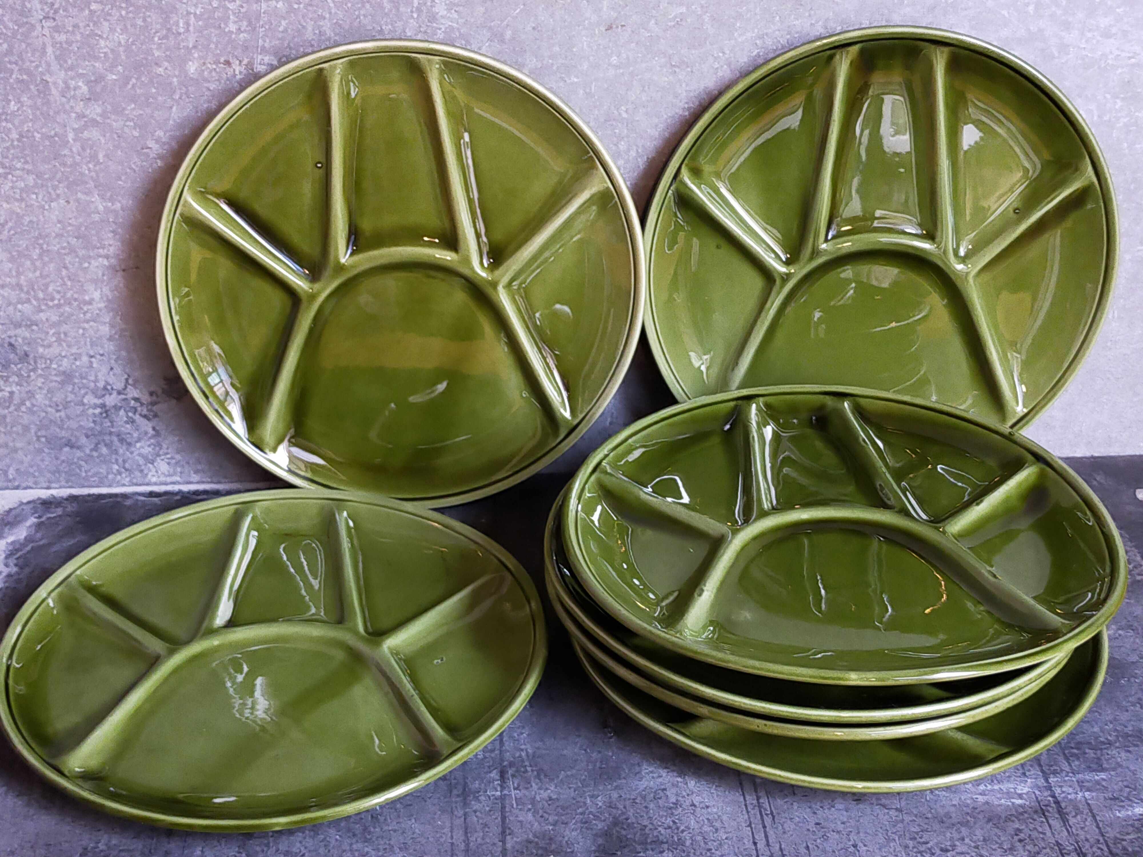 Seven vintage niderviller ceramic plates