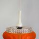 Transparent plastic space age lustre with orange band from the 70s.