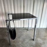 Vintage design magazine rack in chrome metal