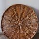 Medium round wicker plateau with two handles.