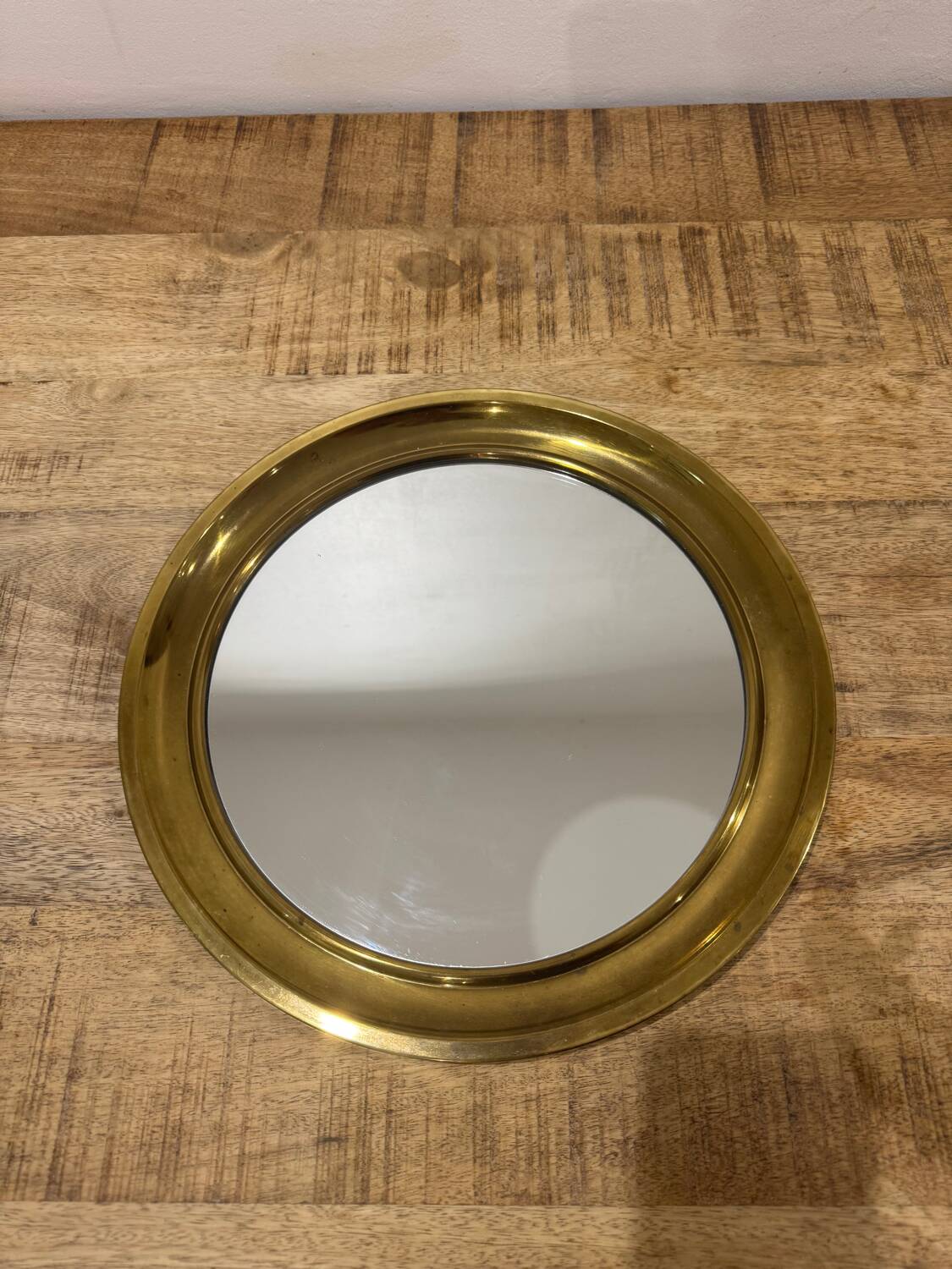 Golden round mirror