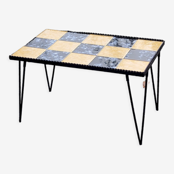 Coffee table of the 60s in yellow and black ceramic wrought iron base
