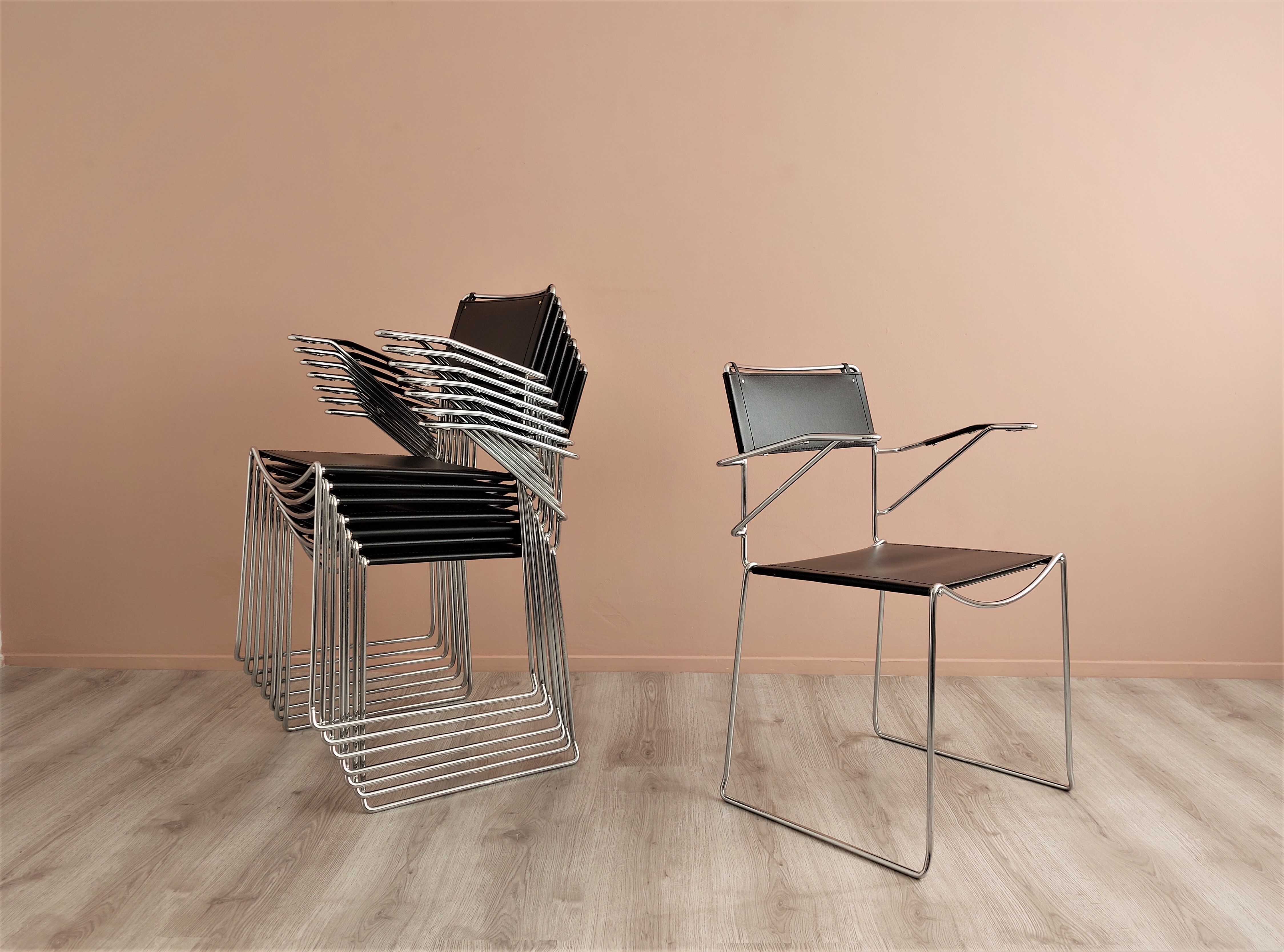 Set of 8 Italian Stackable Metal Wire Dining Chairs, 1980's.