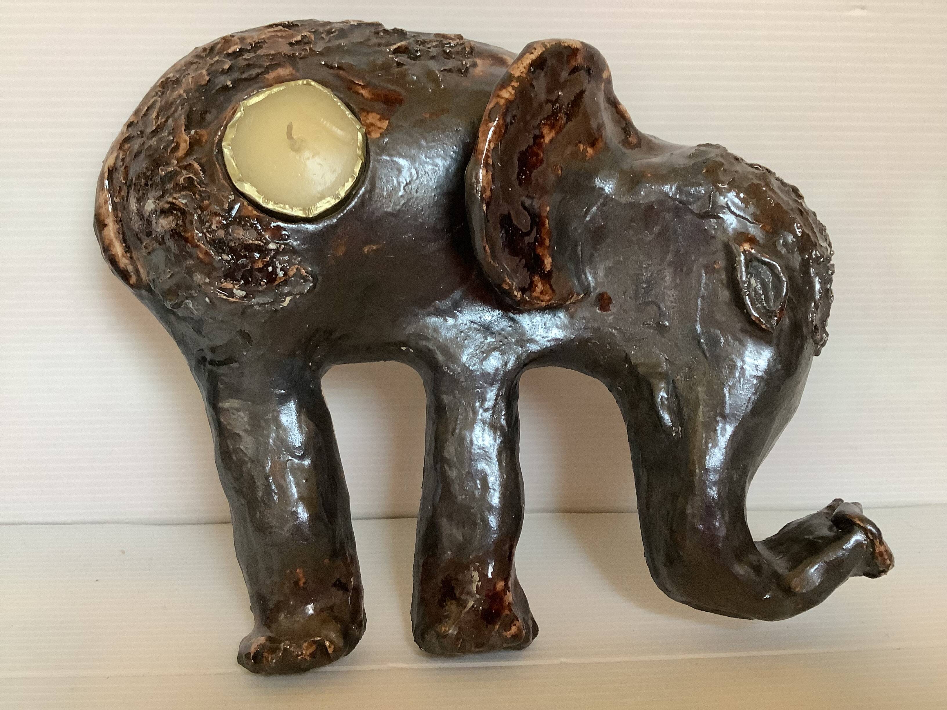 Iridescent ceramic elephant candlestick signed