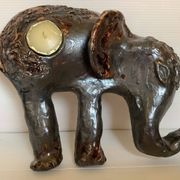 Iridescent ceramic elephant candlestick signed