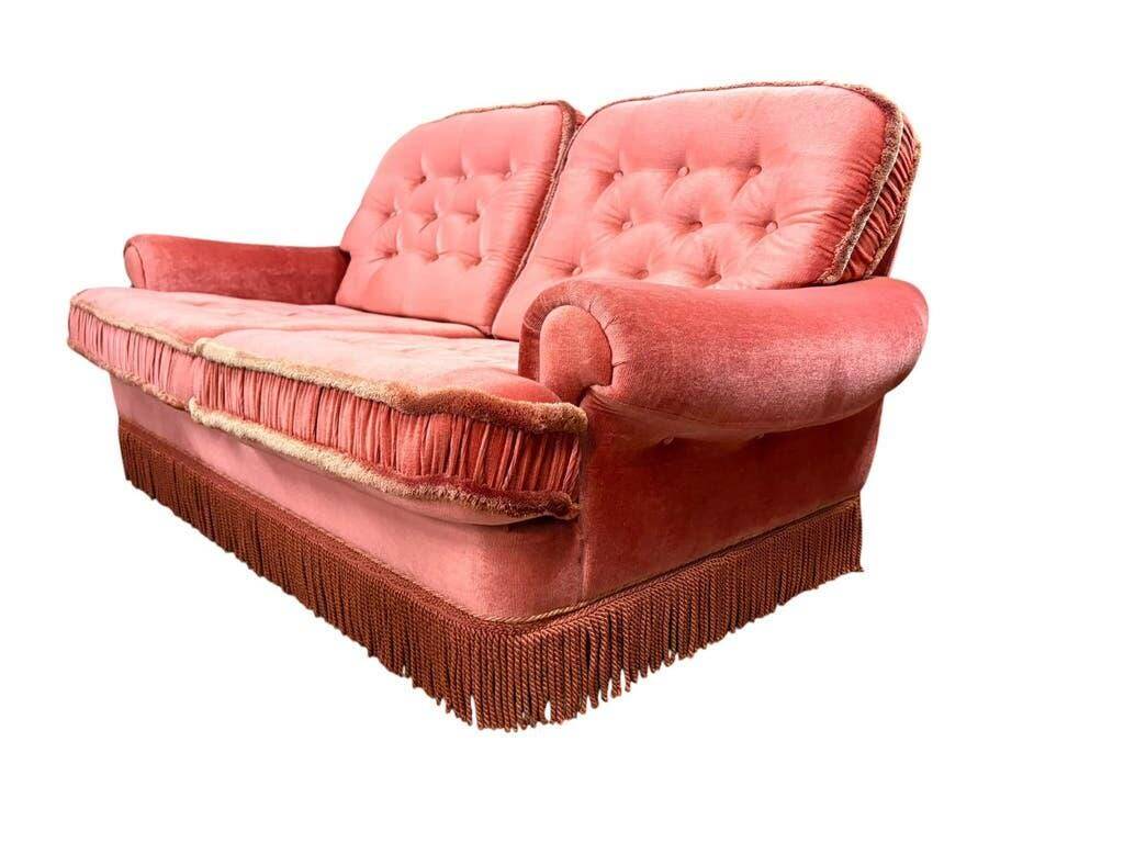 Vintage pink two-seater sofa with fringes