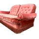 Vintage pink two-seater sofa with fringes