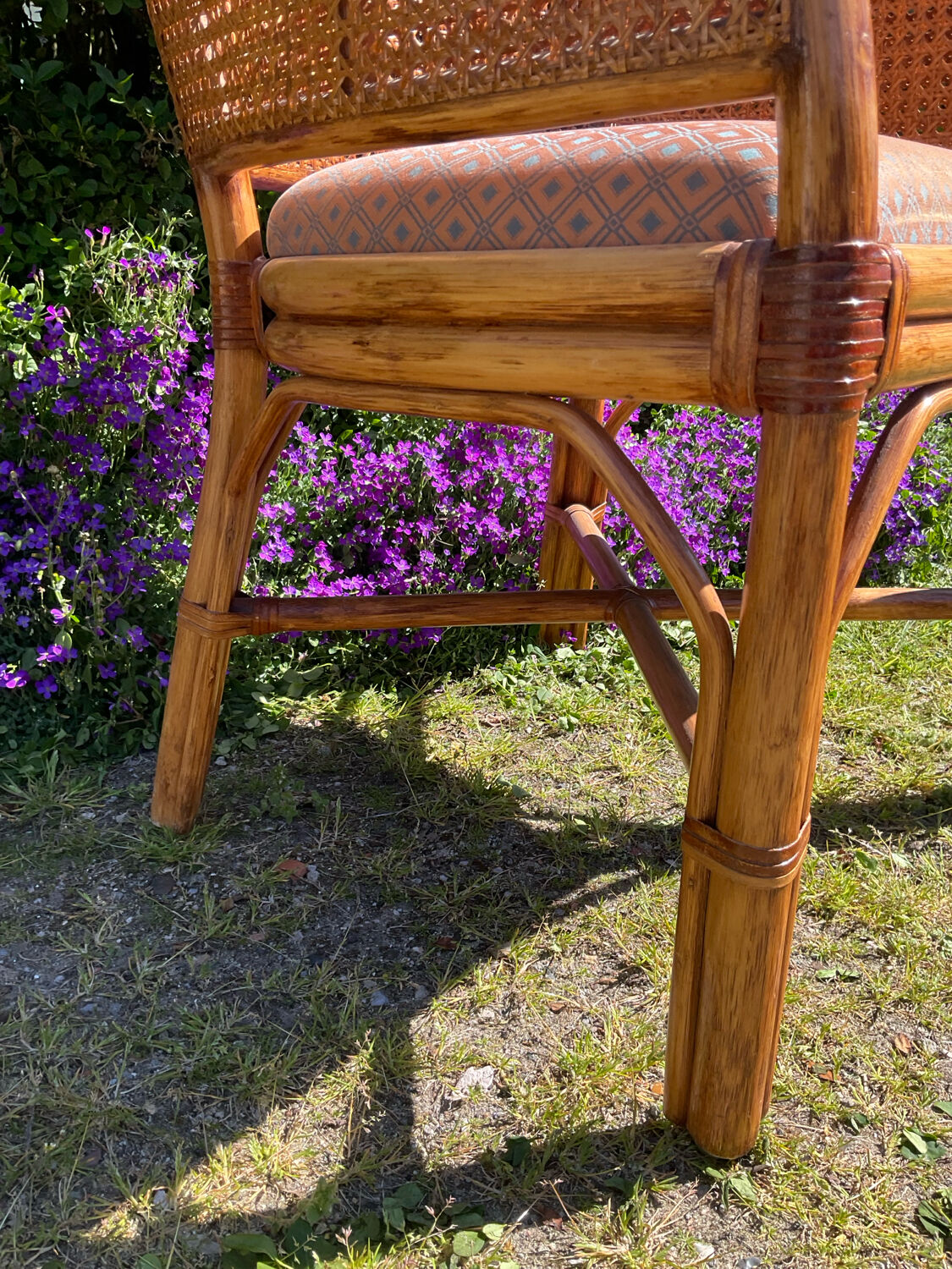 Mc Guire style armchair in rattan and caning from the 1980s.