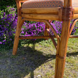 Mc Guire style armchair in rattan and caning from the 1980s.