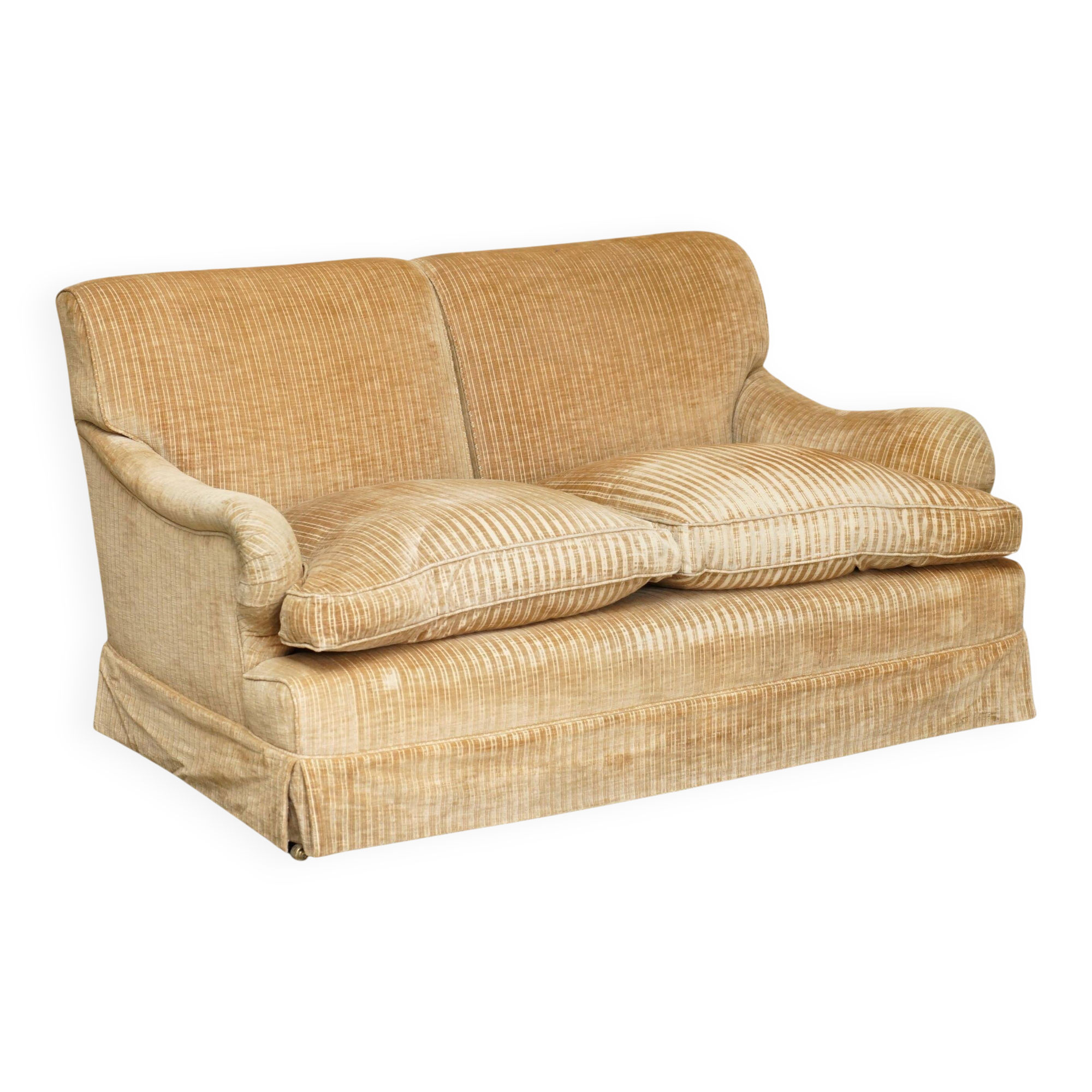 Howard & Sons / Chairs Ltd two-seater canapé with feather-filled cushions.