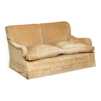 Howard & Sons / Chairs Ltd two-seater canapé with feather-filled cushions.