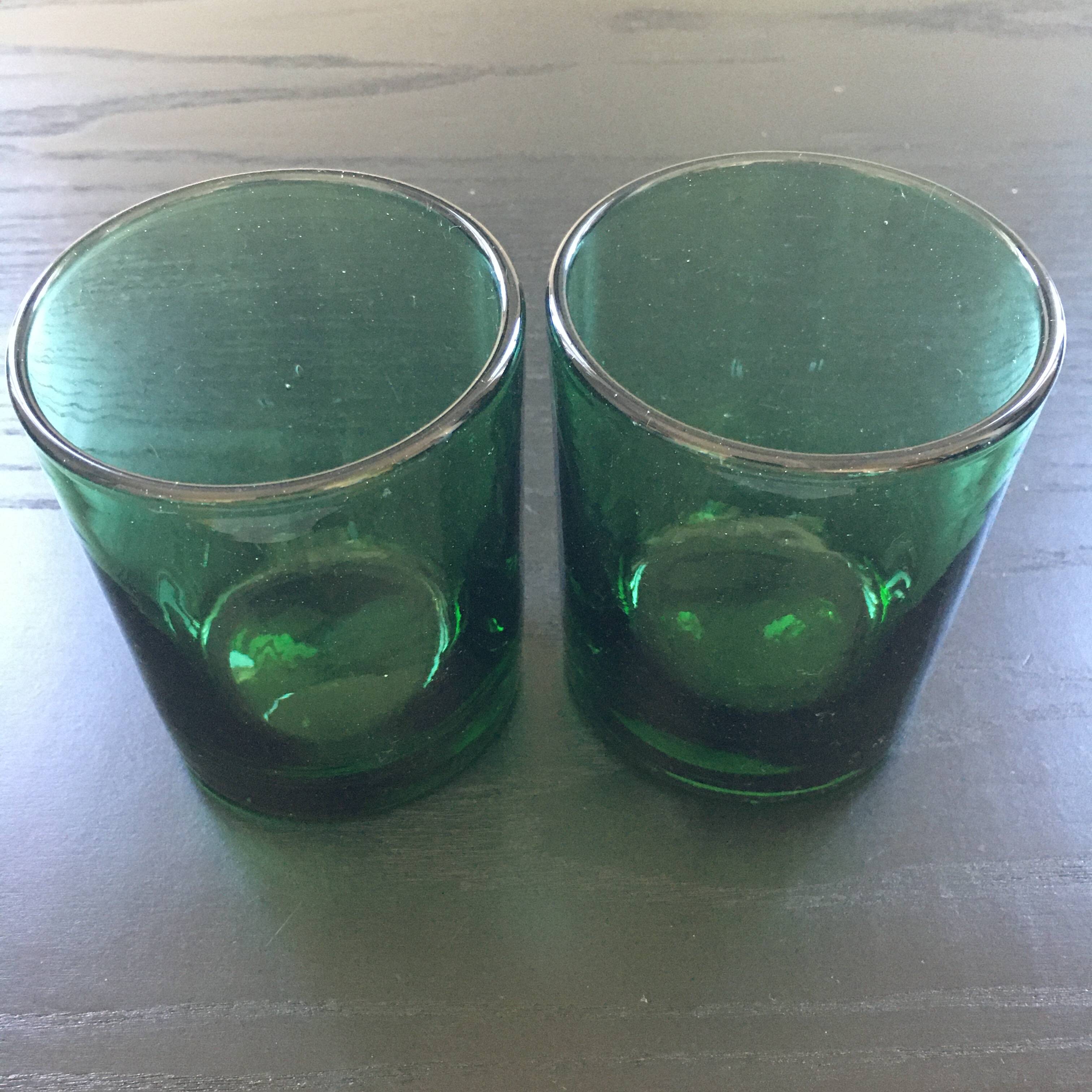 Pair of thick green glasses