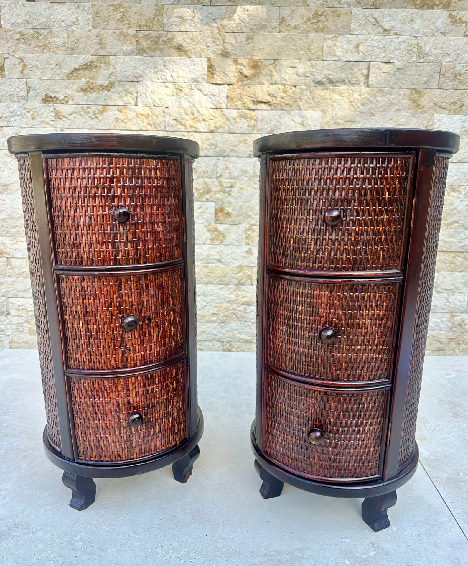 Pair of cylindrical bedside tables or drum bedside tables in exotic wood.