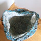 Wicker worker round basket with work, knitting