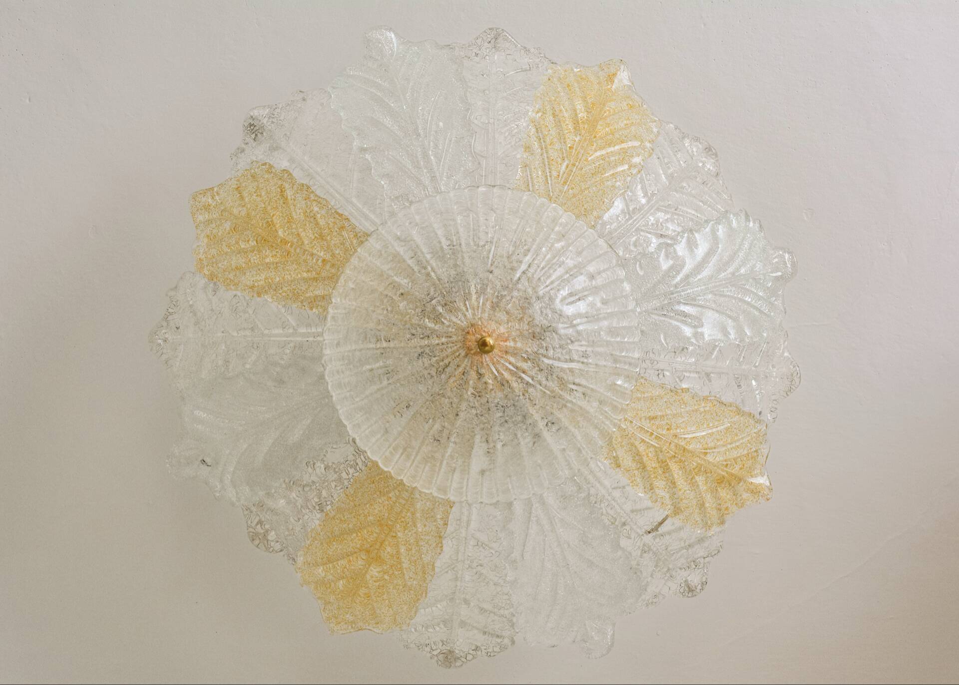 Vintage Murano chandelier/ceiling light with 16 white and amber leaves.