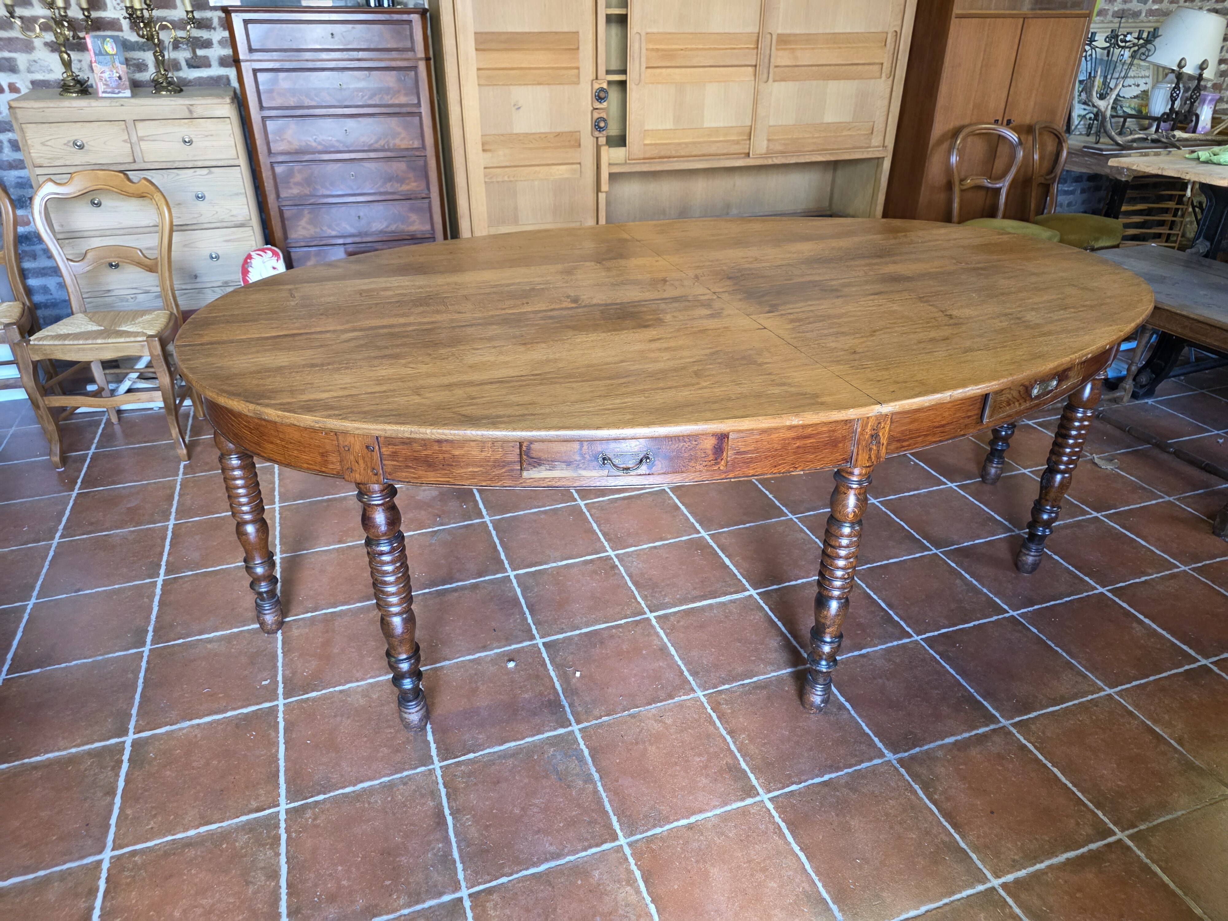 Large oval monastery table in solid oak, 19th century, 243×154cm