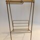 Magazine holder table in gold metal 1950 vintage
