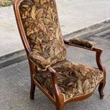 Louis XV Voltaire armchair in solid wood and floral velvet fabric from the years.