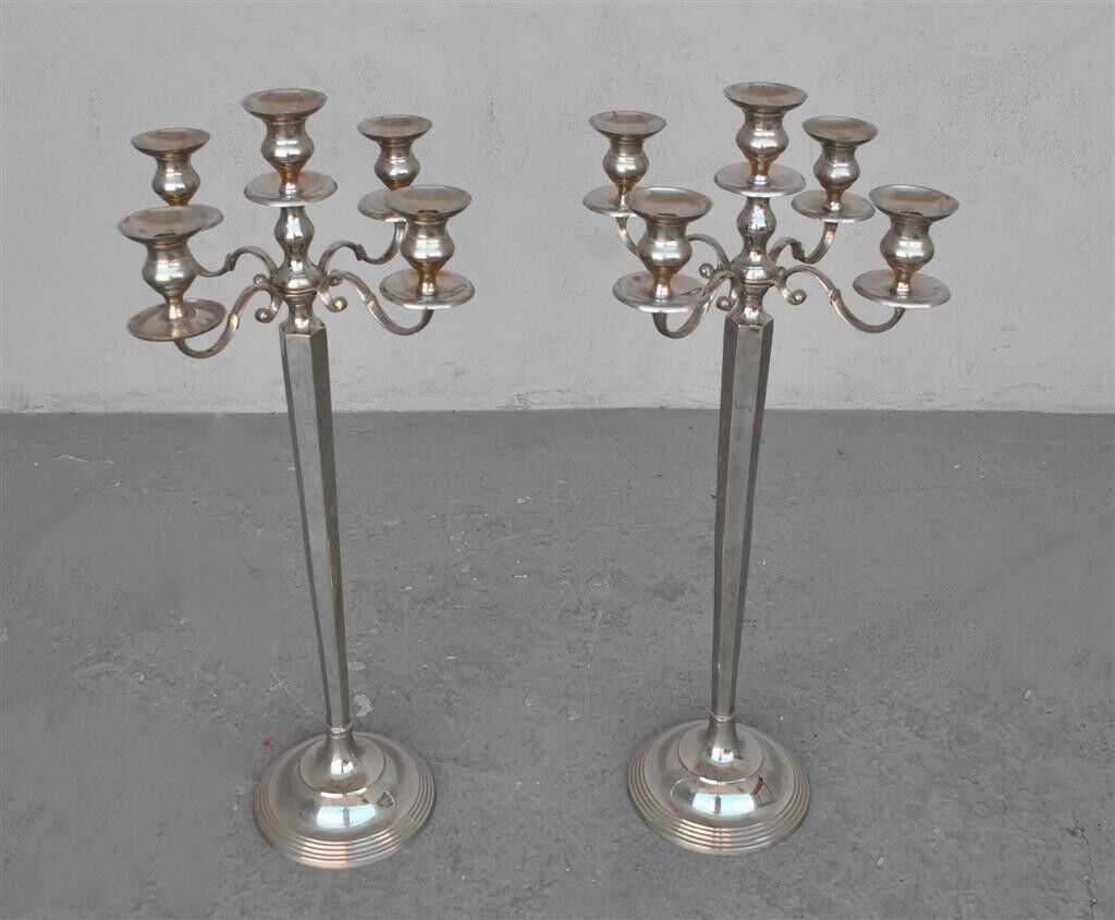 Pair of candlesticks on silver feet
