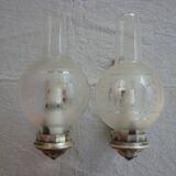 Pair of silver metal and glass sconces