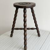 Antique three-legged twisted wooden stool