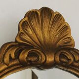 Old mirror in gilded wood