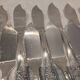 12 forks, 12 fish knives, silver-plated metal, rocaille pattern