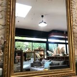 Old mirror 139cm/ 91cm Louis-Philippe with pediment period early 19th, presence of gold leaf.