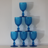 Old table set in blue pressed moulded glass