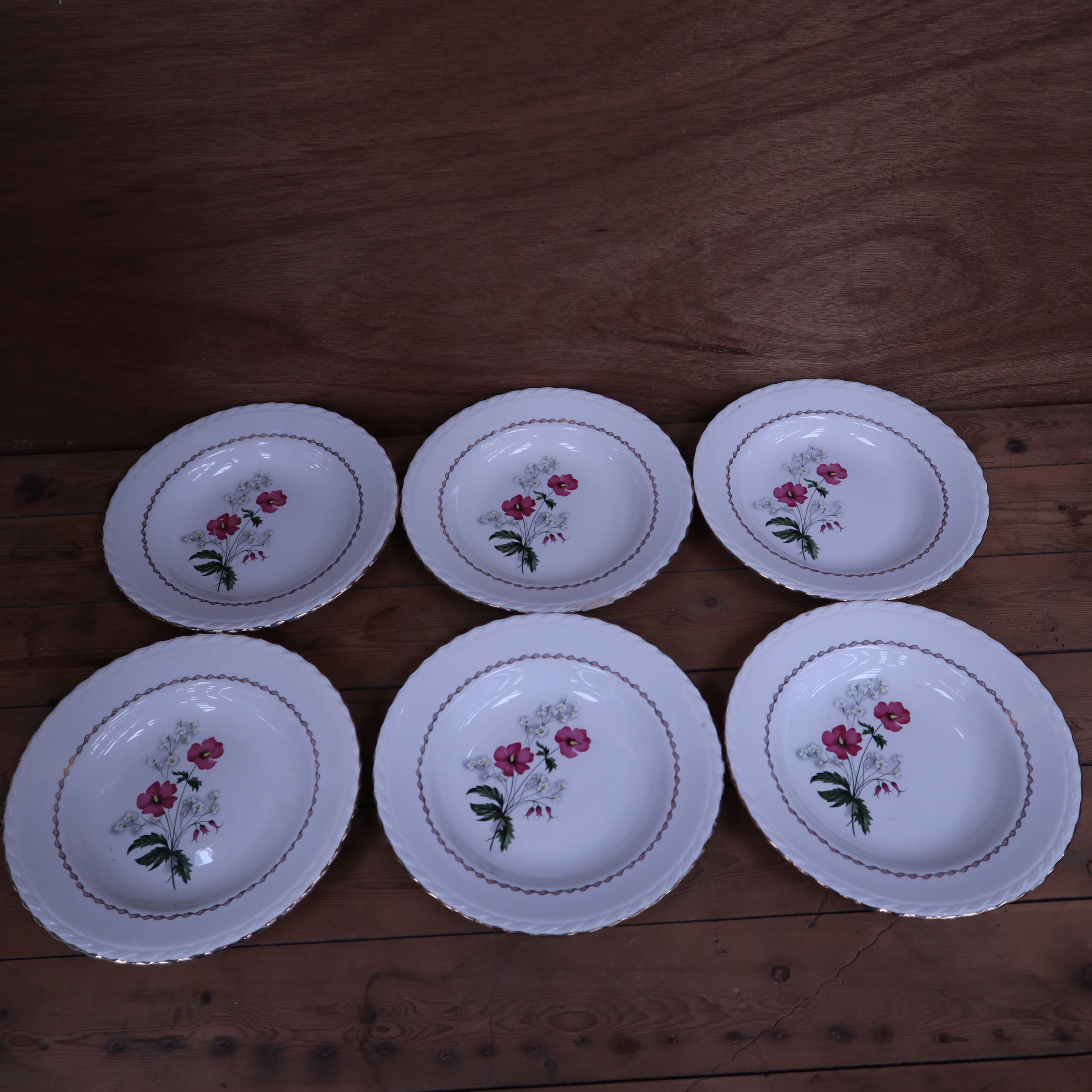 6 deep plates in earthenware l'Amandinoise with floral decoration.
