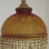 Vintage French amber mottled glass hanging ceiling light with beaded fringe.