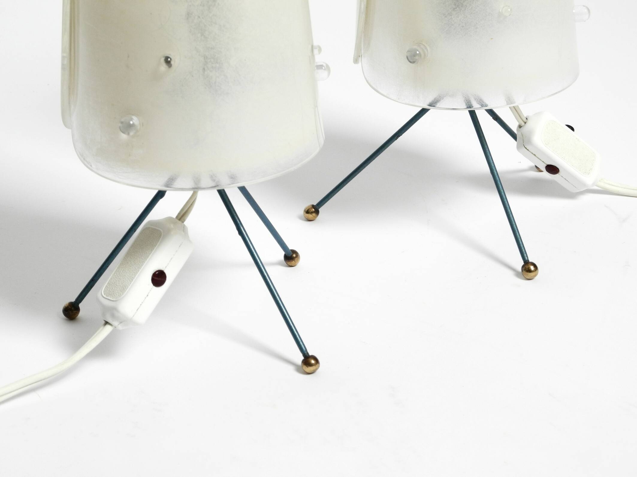 Two very Mid Century Modern tripod table lamps with white plexiglas shades