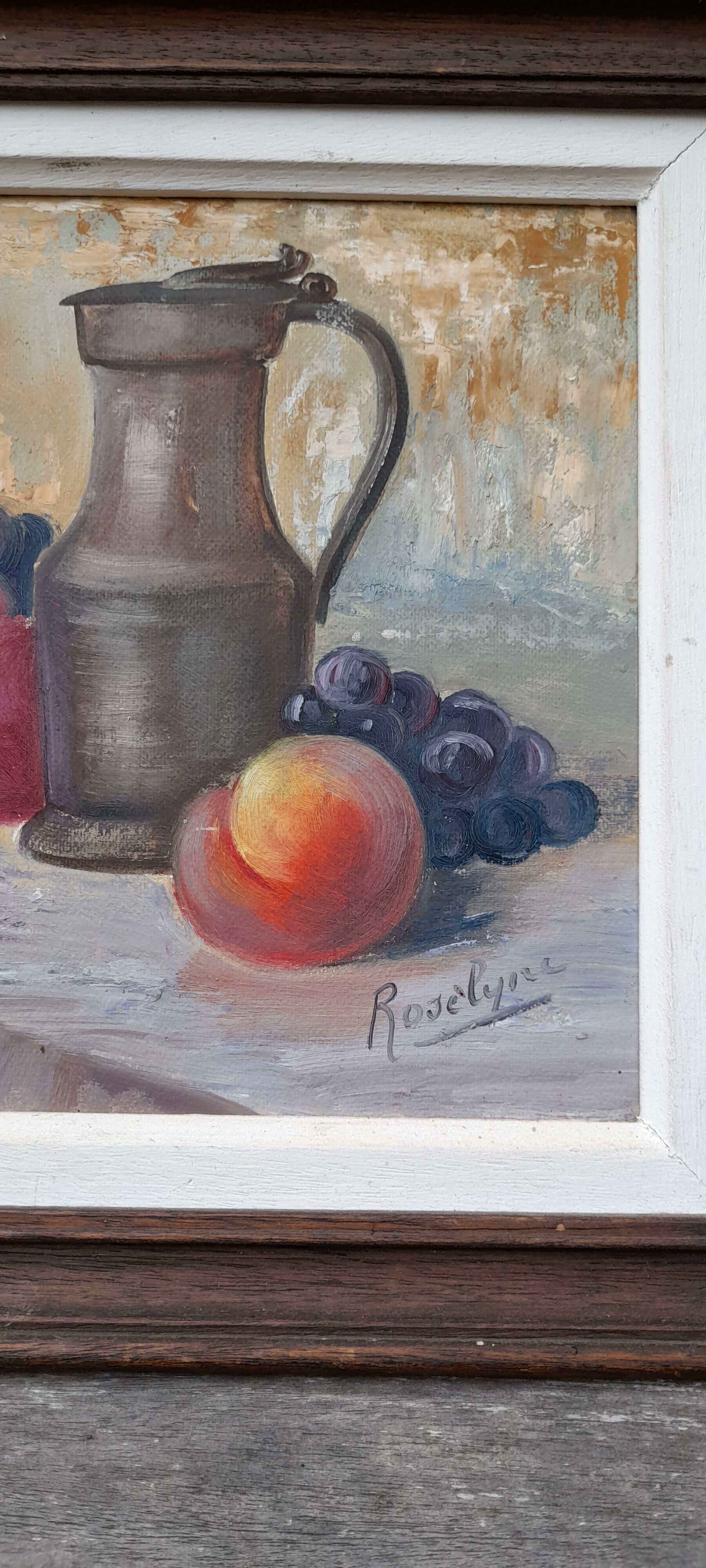 Still life painting with fruit, peach, bunch of grapes and tin pitcher, signed "roselyne"