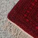 Vintage Baluch carpet handmade from natural wool, Afghanistan 1960.