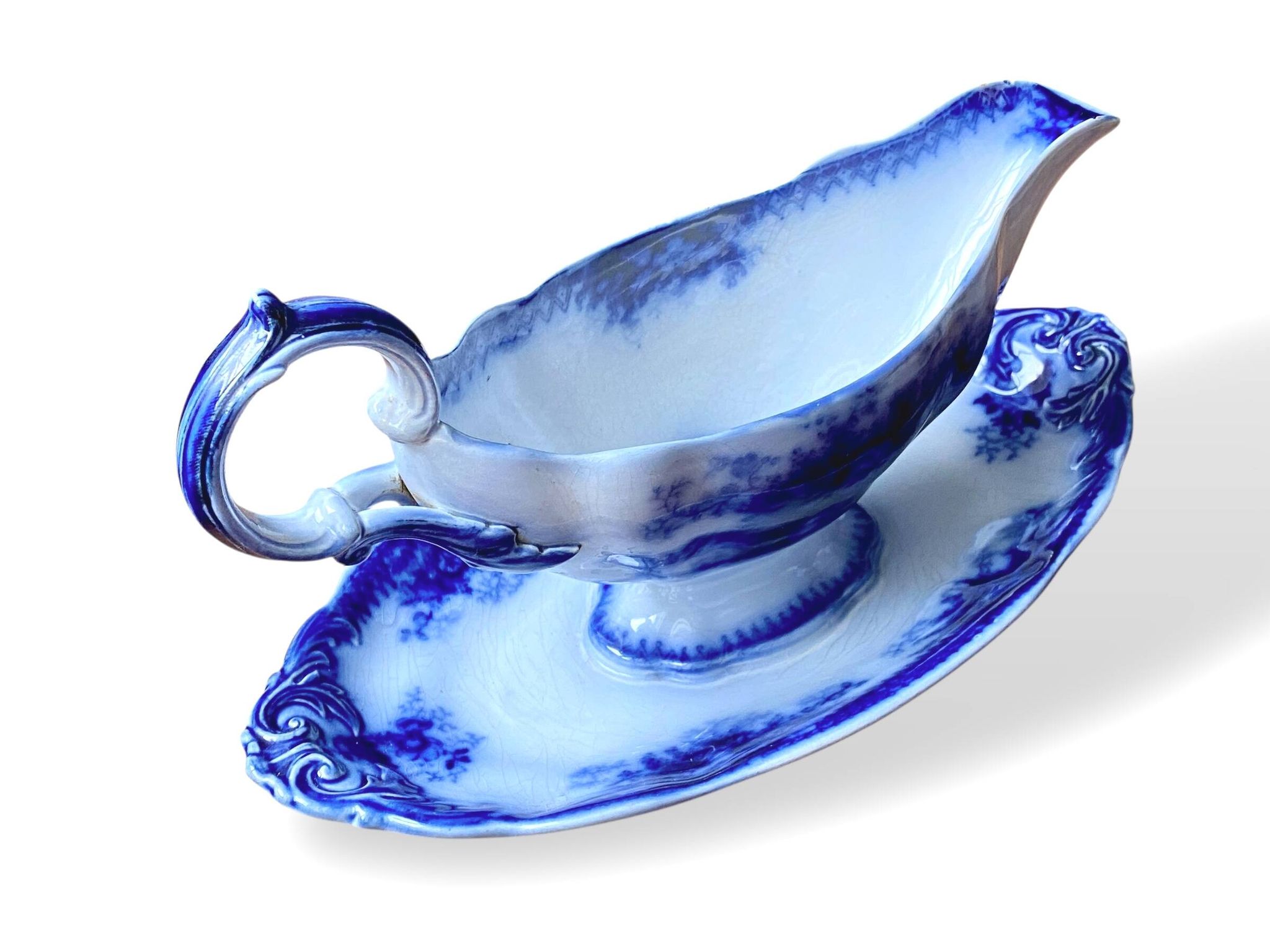 Large antique gravy boat on a Sarreguemines U&C earthenware tray