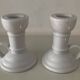 Pair of vintage cellar rat porcelain candlesticks