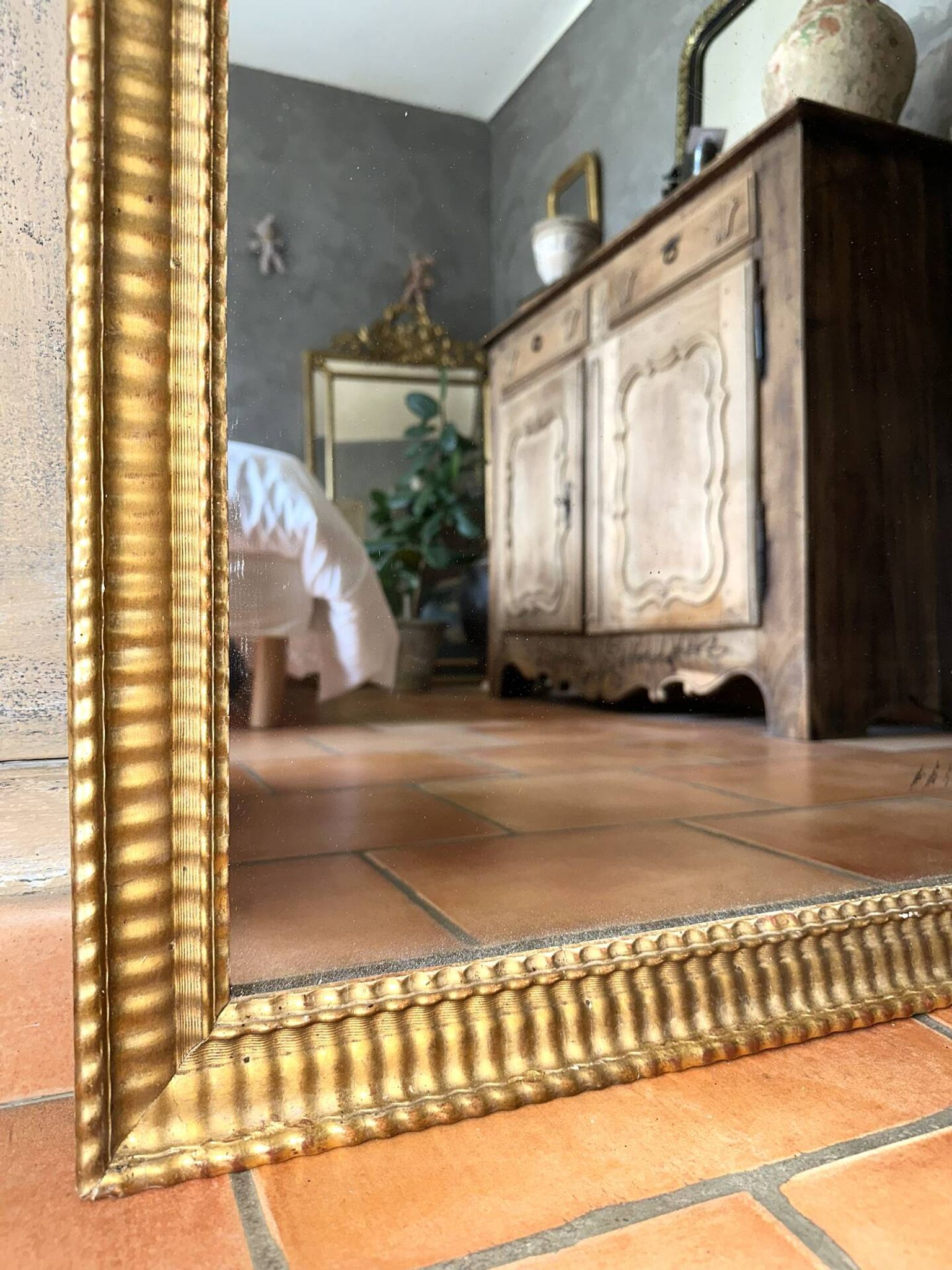Antique Napoleon III gilded mirror from the 19th century.