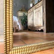 Antique Napoleon III gilded mirror from the 19th century.