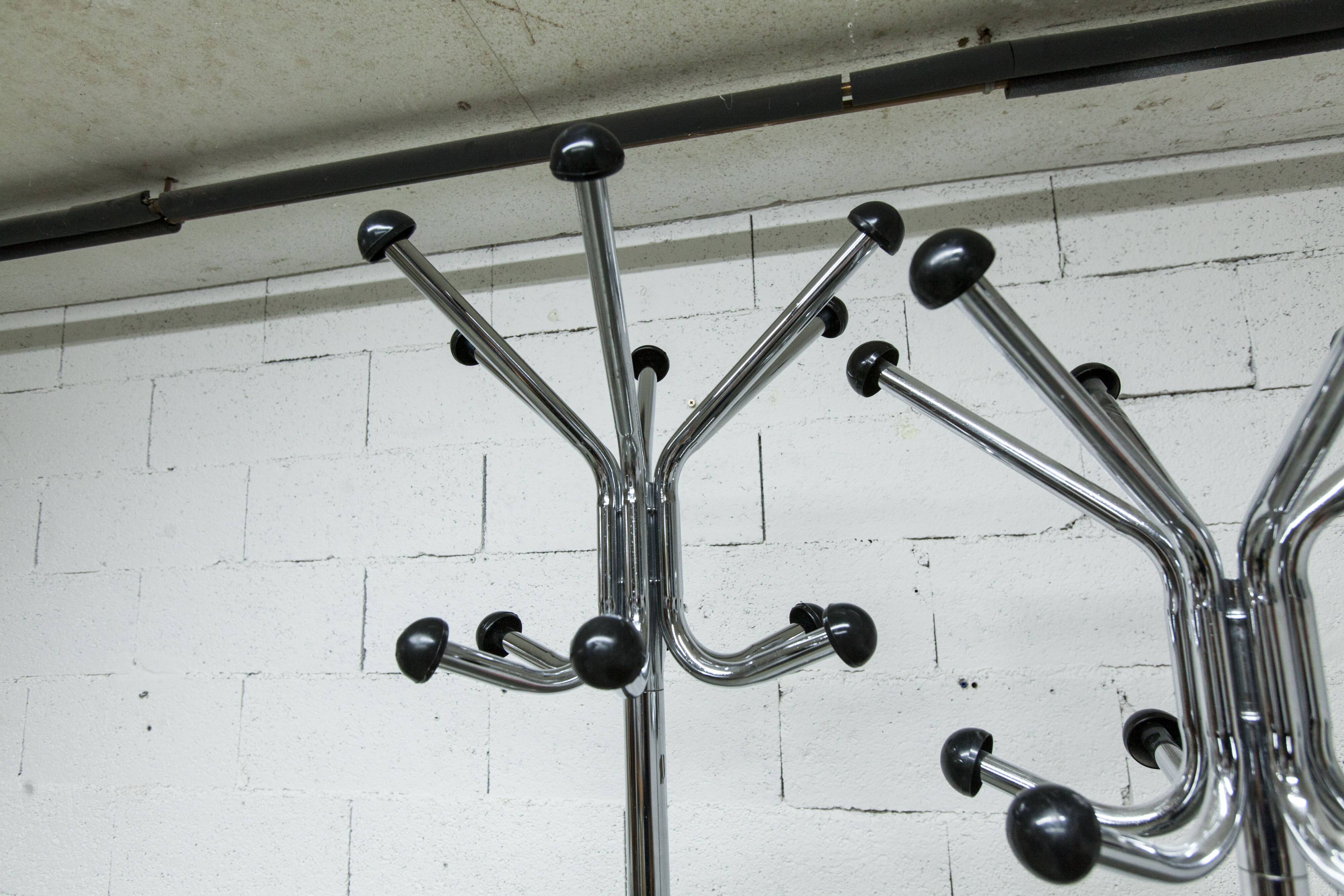 Coat rack with 12 chrome and black plastic hooks, 1960, 2m.
