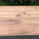 Antique Louis Philippe style farm table in solid cherry wood with 2 drawers and turned base.