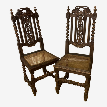 Duo of carved wooden chairs