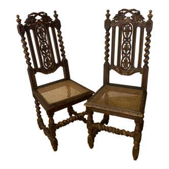 Duo of carved wooden chairs