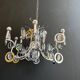 Chrome Metal Design with Swirls and Optical Glass Lenses. Tra