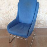 Armchair and its footrest