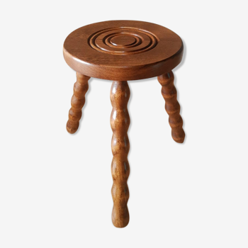 Low wood tripod stool turned countryside