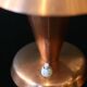 Pair of Bauhaus style mushroom lamps in copper metal.
